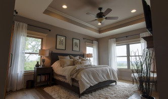 master suite with tray ceiling